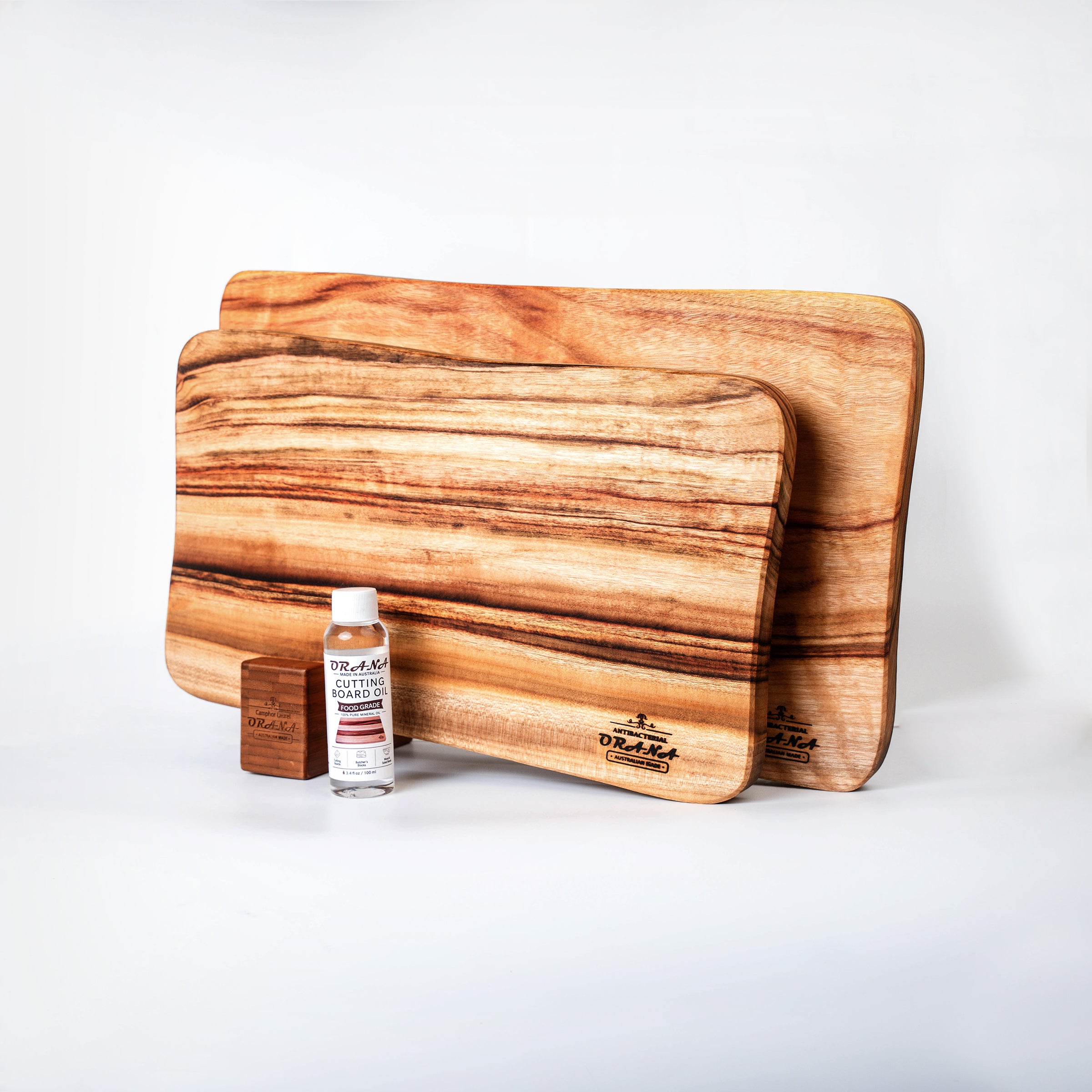 Orana Signature Wavy Australian Premium Camphor Laurel Single Piece Cutting Board Set – 2 Boards with Stands & Mineral Oil (40x23cm, 46x28cm)
