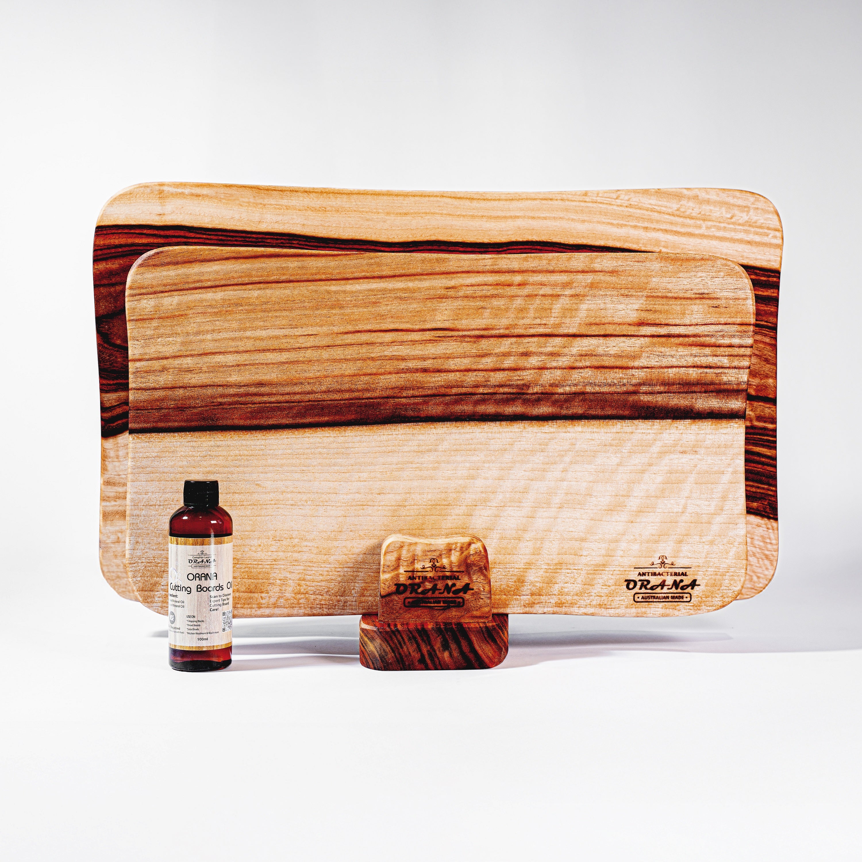 Orana Wavy Camphor Laurel Single Piece Cutting Board Set – 2 Boards with Stands & Mineral Oil (40x23cm, 46x28cm)
